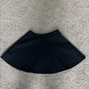 BETHANY MOTA black skirt